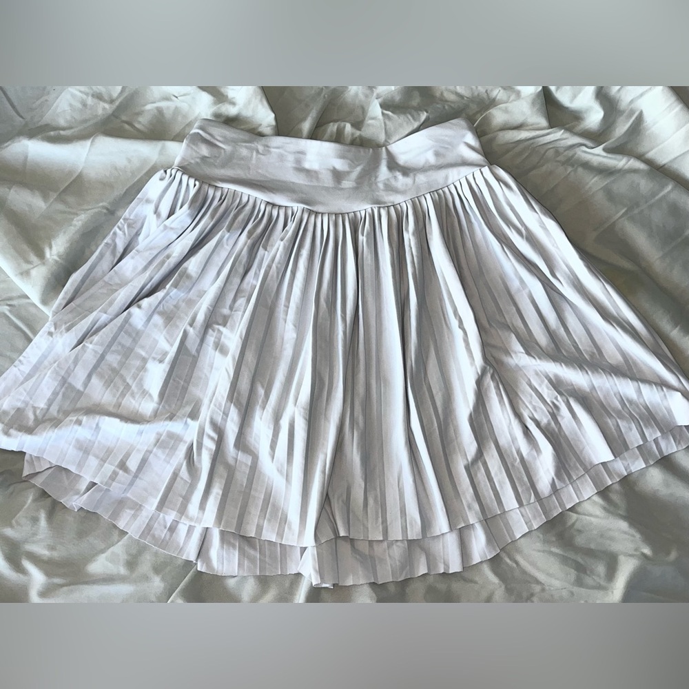 Pleated high-rise tennis skirt with built in shorts